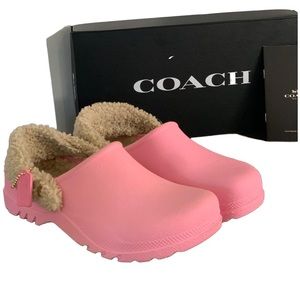Coach leather wear.